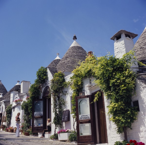 ITALY, Puglia, Alberobello, Traditional Trulli houses.