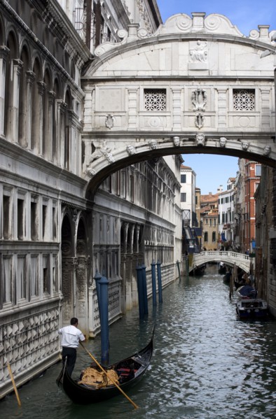 ITALY, Veneto, Venice, Gondola with tourists passes along the Rio Del Palazzo under the Bridge of