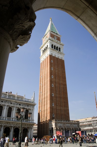 ITALY, Veneto, Venice, The Campanile in Piazza San Marco seen through an arch below the Doges