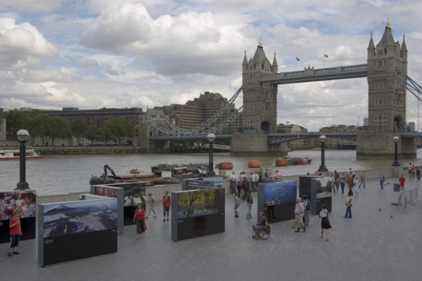 ENGLAND, London, The Queens walk open air exhibition outside the GLA city hall with Tower Bridge