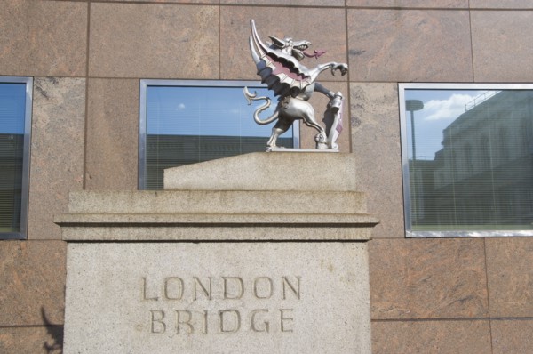 ENGLAND, London, London Bridge detail with statue of Griffin on the Southwark side. Griffins mark