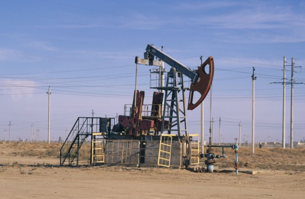 KAZAKHSTAN, Krzloroa, Oil derrick in a rural setting..