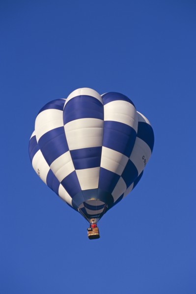 ENGLAND, Bristol, Blue and white checked hot air balloon.