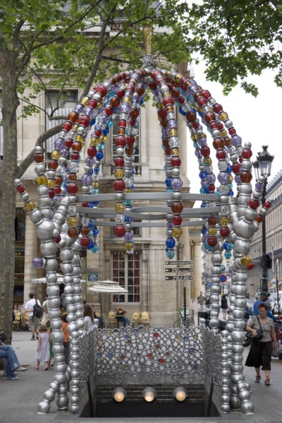 FRANCE, Ile de France, Paris, Colourful modern metal and glasswork entrance to the Metro in Place