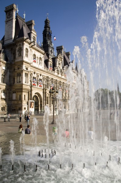 FRANCE, Ile de France, Paris, The Hotel de Ville town hall with people in the square in front of it