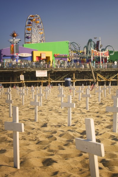 USA, California, Santa Monica, A graphic protest against the war in Iraq beneath Santa Monica Pier.