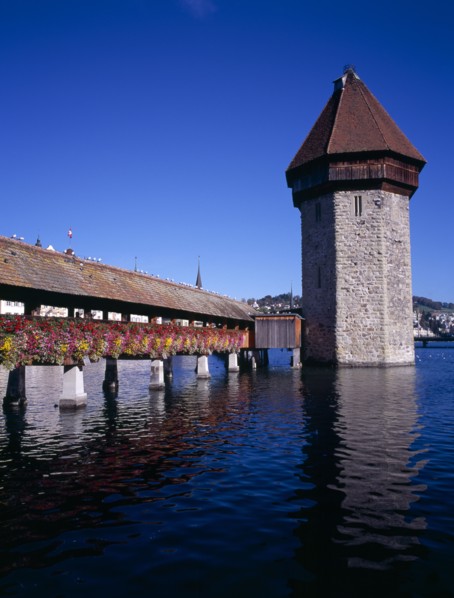 SWITZERLAND, Lucerne Central, Lucerne, Kappelbrucke flower decked covered bridge spanning across