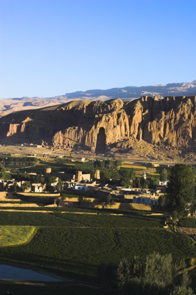 AFGHANISTAN, Bamiyan Province, Bamiyan , View of Bamiyan valley and village showing cliffs with