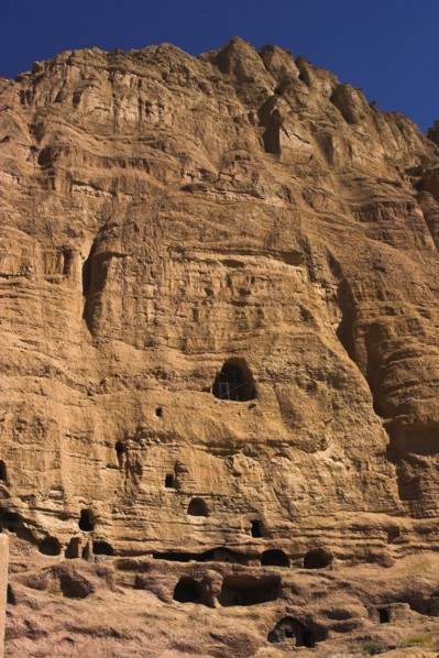 AFGHANISTAN, Bamiyan Province, Bamiyan , Caves in cliffs near empty niche where the famous carved