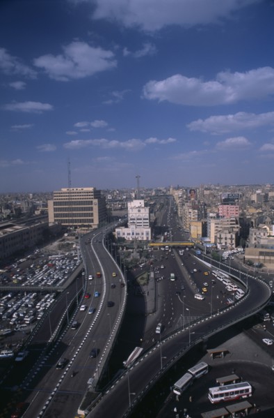 EGYPT, Cairo Area, Cairo, Elevated view over busy road network and tall city buildings