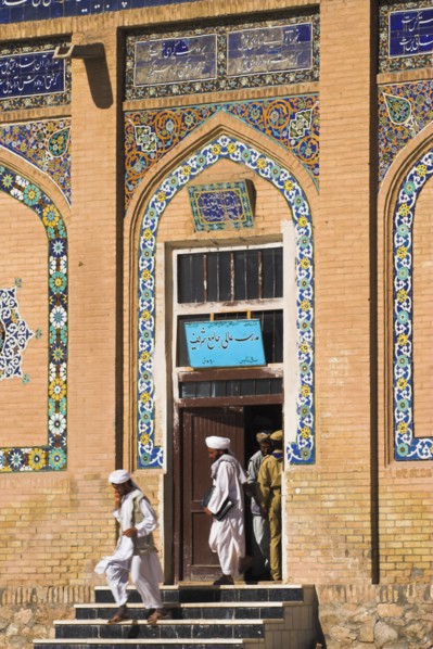 AFGHANISTAN, Herat, Men leaving Friday Mosque or Masjet-eJam Originally laid out on the site of an
