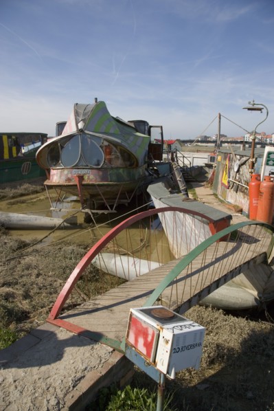 ENGLAND, West Sussex, Shoreham-by-Sea, "Houseboat moored along the banks of the river adur.  Former