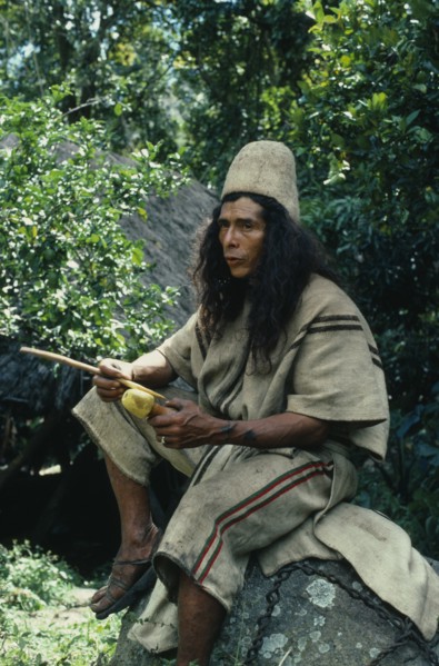 COLOMBIA, Sierra Nevada de Santa Marta, Ika, Ika man in traditional dress  helmet of woven cactus