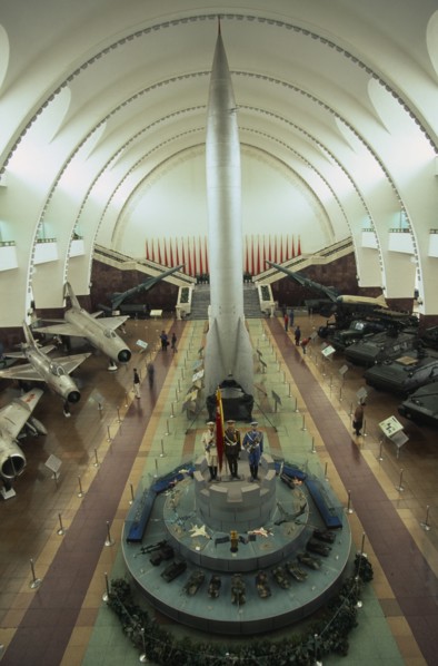 CHINA, Beijing, "Interior hall of the Chinese Military Museum with visitors looking at display of