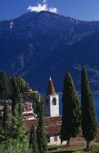 ITALY, Lombardy, Lake Garda, "Pieve.  View of tiled rooftops, church and bell tower of village