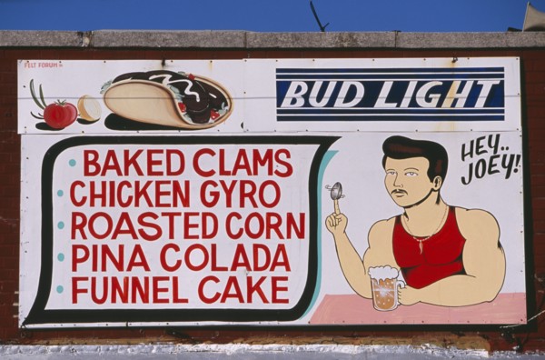 USA, New York, New York City, Coney Island.  Sign for cafe / bar listing food and drink  with