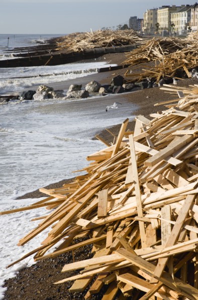 ENGLAND, West Sussex, Worthing, Timber washed up on the beach from the Greek registered Ice