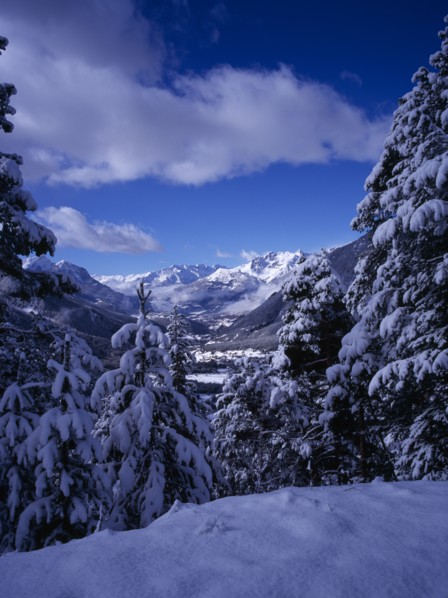 FRANCE, Provence-Cote d’Azur, Hautes-Alpes, View west from Col de Montgenevre over snow covered
