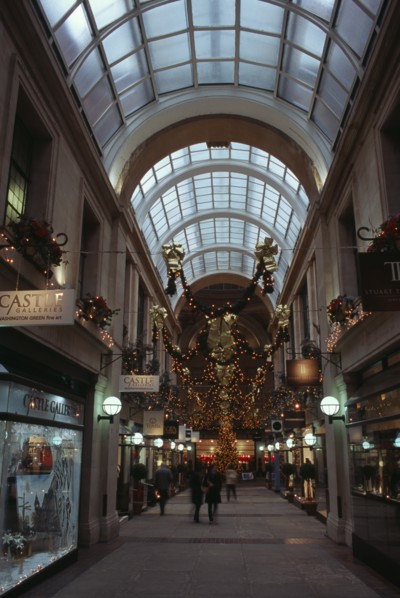 ENGLAND, Nottinghamshire, Nottingham, Exchange Arcade interior decorated at Christmas with people