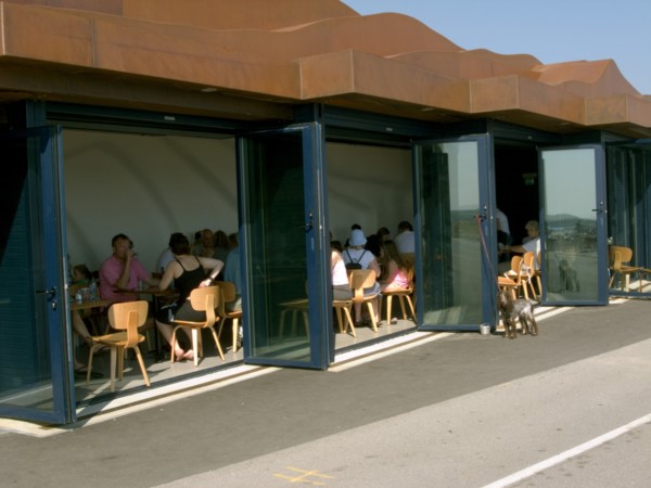 ENGLAND, West Sussex, Littlehampton, Customers sitting at tables inside the East Beach Cafe