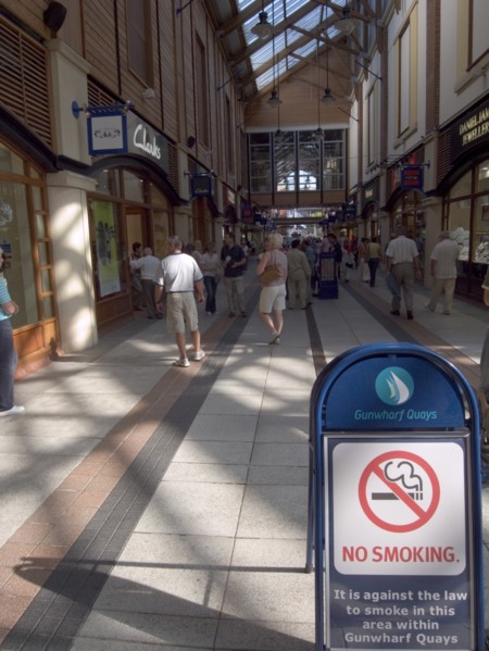 ENGLAND, Hampshire, Portsmouth, No Smoking sign in the Gunwharf Quays shopping complex