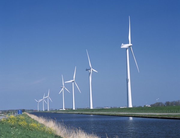 HOLLAND, Noord Holland, Alkmaar, Row of Wind turbines along the Noord Hollands Kanaal north of