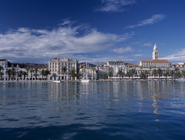 CROATIA, Dalmatia, Split, Harbour and waterfront with St Domnius Cathedral spire behind