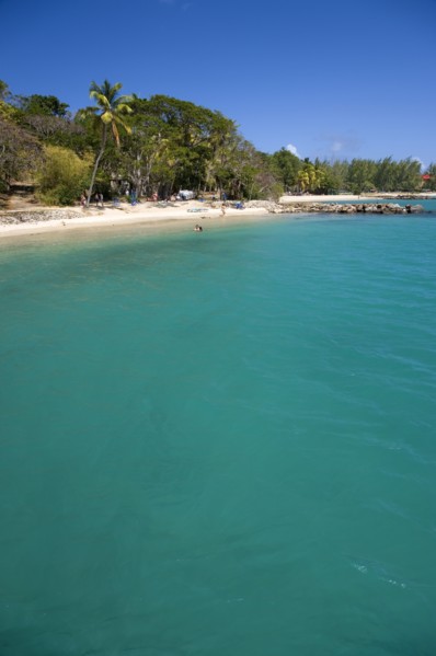 WEST INDIES, St Lucia, Gros Islet , Pigeon Island National Historic Park Tourists on the beach