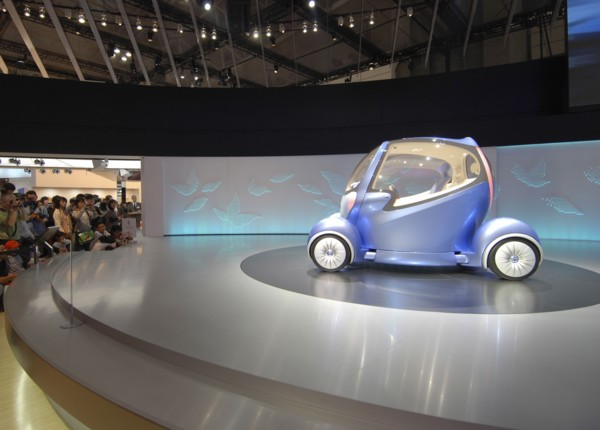 JAPAN, Honshu, Chiba, "2007 Tokyo Car Show, crowd viewing the Nissan concept car Pivo 2"