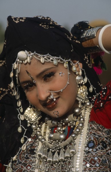 INDIA, Rajasthan, Jaisalmer, Head and shoulders portrait of a Miss Desert contestant  wearing
