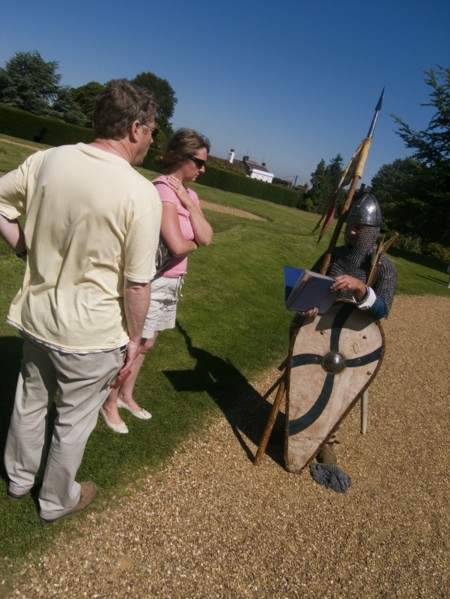 ENGLAND, East Sussex, Battle, "Battle Abbey. Visitors in grounds of partially ruined abbey complex,