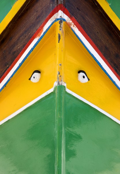 MALTA, Marsaxlokk , Fishing village harbour on the south coast with colourful Kajjiki fishing boat
