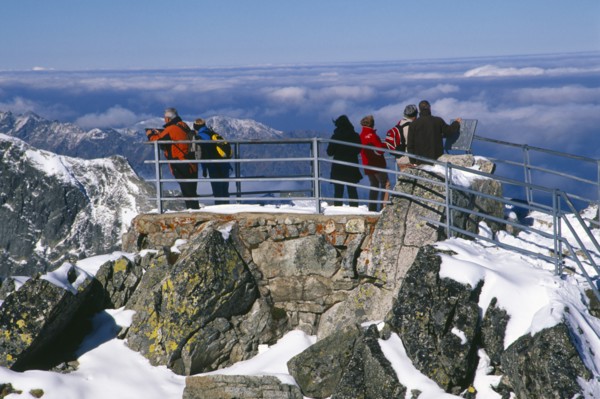 SLOVAKIA, Carpathian Mtns, High Tatras Mtns, People at the Lomnicky Stit viewpoint with views