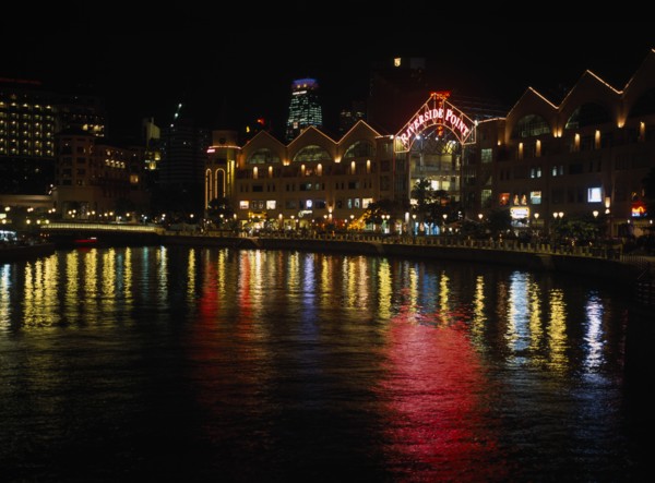 SINGAPORE, Clarke Quay, Lights from quayside shops and restaurants reflected in the Singapore River