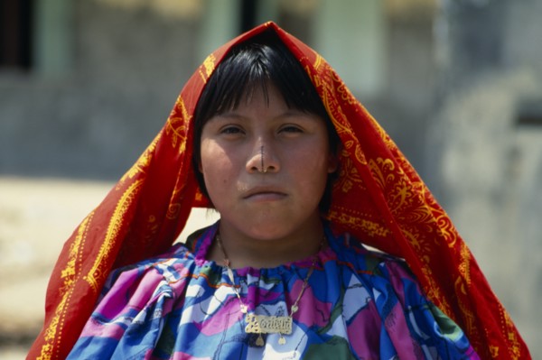 PANAMA, San Blas Islands, Kuna Indigenous Tribe, Portrait of young Kuna Indian girl wearing