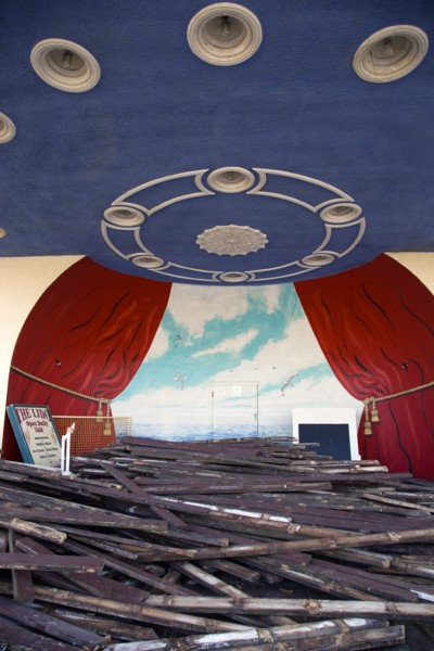 ENGLAND, West Sussex, Worthing, Piles of old decking in the bandstand on the day that timber was
