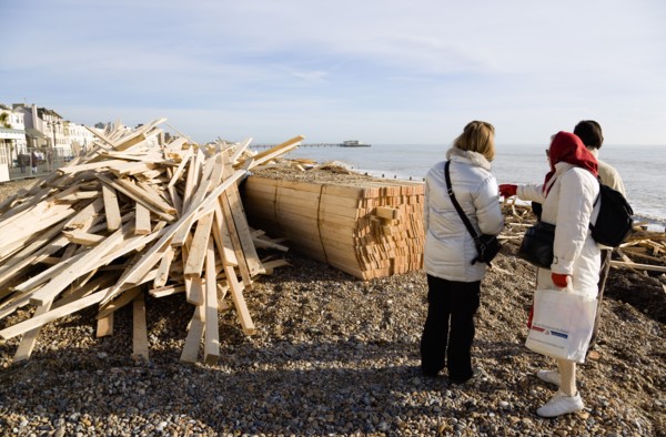 ENGLAND, West Sussex, Worthing, Timber washed up on the beach from the Greek registered Ice
