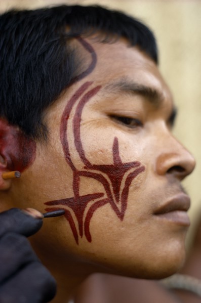 COLOMBIA, North West Amazon, Tukano Indigenous Tribe, Barasana man (sub group of Tukano) decorating