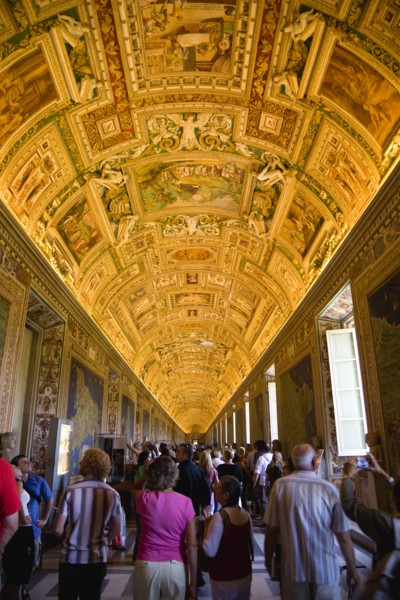 ITALY, Lazio, Rome, Vatican City Museum Tourists in the Gallery of Maps showing the illuminated