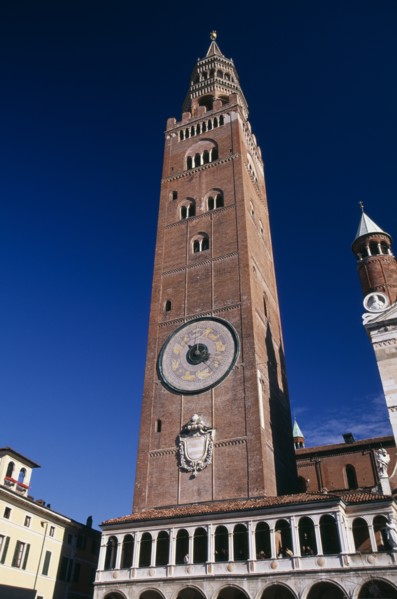 ITALY, Lombardy, Cremona, Piazza del Comune.  Medieval bell tower known as the Torrazzo linked by a