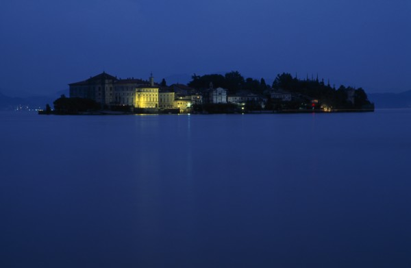 ITALY, Piedmont, Lake Maggiore, Borromeo Islands.  View across lake towards small rocky island of