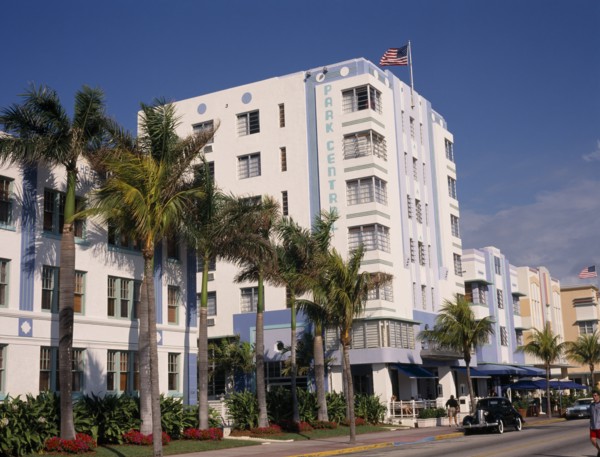 USA, Florida, Miami, South Beach. Ocean Drive. Park Central Hotel exterior lined with palm trees