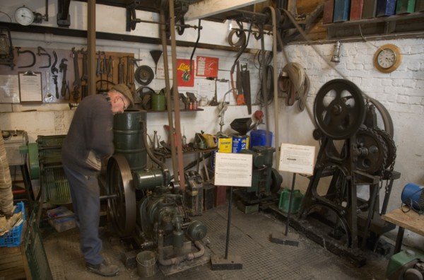 ENGLAND, West Sussex, Amberley, "Amberley Working Museum. The Engine Workshop with a collection of