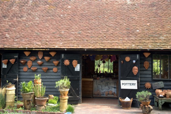 ENGLAND, West Sussex, Amberley, Amberley Working Museum. Pottery building with examples of clay