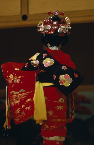 JAPAN, People, Children, "Young girl seen from behind, wearing traditional red embroidered kimono