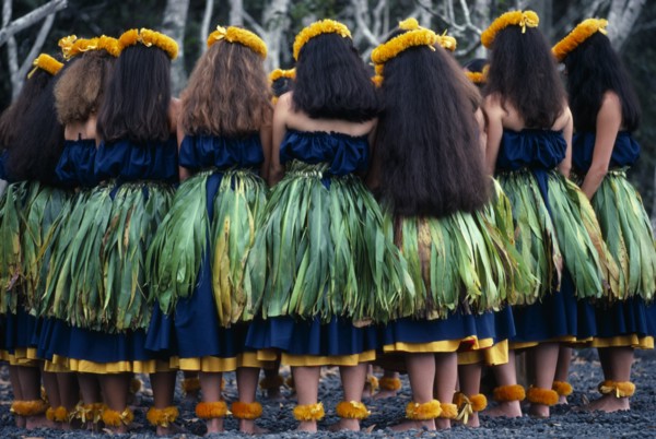 USA, Hawaii, Halemaumau Crater, "Group of dancers stand in circle with bowed heads beside the