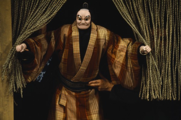 JAPAN, Arts, Performance, Bunraku puppet male character appearing from behind curtains with