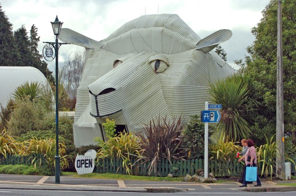 NEW ZEALAND, NORTH ISLAND, WAIKATO, "TIRAU, A CORRUGATED IRON SHEEP WHICH IS A SHEEPSKIN RUG SHOP