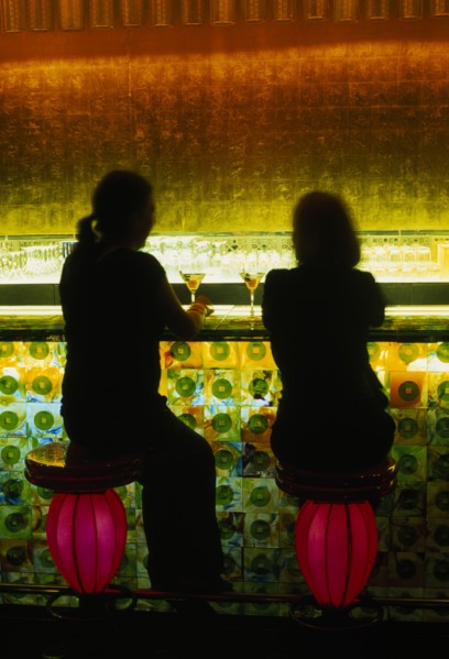 CHINA, Shanghai, Xintiandi District.  Tou Ming Si Kao ( TMSK ) bar interior with two figures having