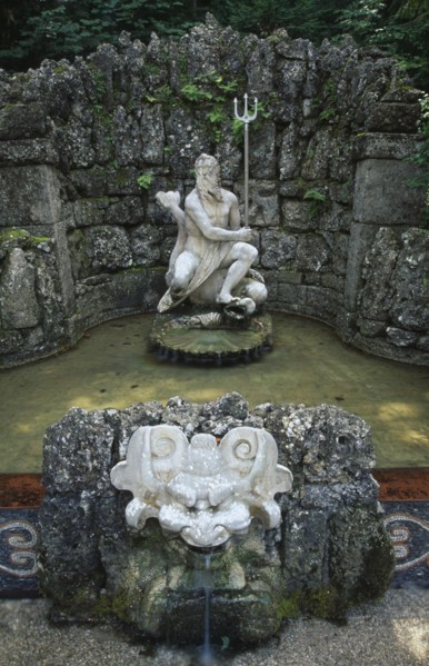 AUSTRIA, Salzburg, Fountain with statue of Neptune in Hellbrunn Palace Gardens known for the